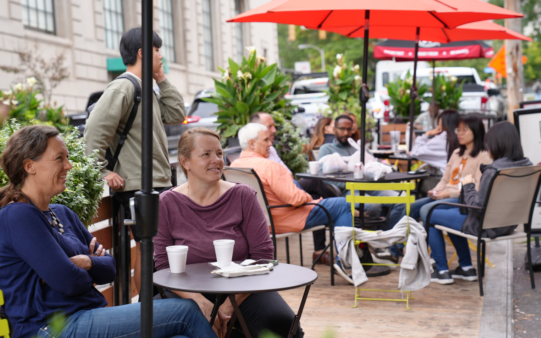 Diners at sidewalk café tables in Oakland